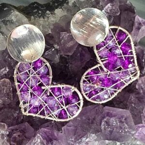 Aros bañados en plata, con cristales lilas y morados