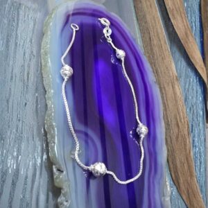 Pulsera con esferas con diseño